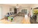 Gathering room with hardwood floors, neutral decor, and backyard access at 5119 W Onyx Ave, Glendale, AZ 85302