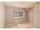 Spacious bedroom with carpeted floors and a window at 5119 W Onyx Ave, Glendale, AZ 85302
