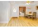 Dining area with hardwood floors and a table for four at 5119 W Onyx Ave, Glendale, AZ 85302