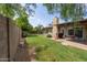 Large backyard with grassy area and a block wall for privacy at 5119 W Onyx Ave, Glendale, AZ 85302