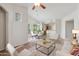 Bright living room with comfy seating and dining area at 14575 W Mountain View Blvd # 221, Surprise, AZ 85374