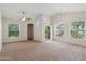 Spacious living room with high ceilings and lots of natural light at 14575 W Mountain View Blvd # 221, Surprise, AZ 85374