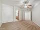 Main bedroom with access to bathroom and another room at 14575 W Mountain View Blvd # 221, Surprise, AZ 85374