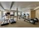 Well equipped fitness center with cardio and weight machines at 14575 W Mountain View Blvd # 221, Surprise, AZ 85374