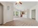 Spacious living room with high ceilings and ceiling fan at 14575 W Mountain View Blvd # 221, Surprise, AZ 85374