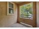 Small balcony with partial view of the parking lot at 14575 W Mountain View Blvd # 221, Surprise, AZ 85374