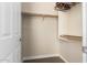 Large walk-in closet with double hanging rods at 9845 E Inglewood St, Mesa, AZ 85207