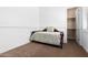 Bright bedroom featuring a daybed and built-in closet at 9845 E Inglewood St, Mesa, AZ 85207