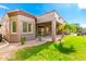 Charming one-story home with landscaped yard and covered patio at 9845 E Inglewood St, Mesa, AZ 85207