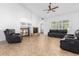 Living room with a fireplace and built-in shelving at 9845 E Inglewood St, Mesa, AZ 85207