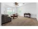 Spacious living room with bay window and comfortable seating at 9845 E Inglewood St, Mesa, AZ 85207