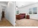 Spacious bedroom with wood furniture and carpet flooring at 9845 E Inglewood St, Mesa, AZ 85207