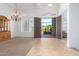 Bright dining room with hardwood floors and a chandelier at 9845 E Inglewood St, Mesa, AZ 85207