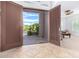 Elegant entryway with double doors opening to a courtyard at 9845 E Inglewood St, Mesa, AZ 85207