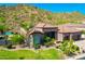 Single-story home with a three-car garage and mountain views at 9845 E Inglewood St, Mesa, AZ 85207