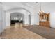 Bright dining room with tile floors and a built-in hutch at 9845 E Inglewood St, Mesa, AZ 85207