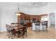 Eat-in kitchen with granite countertops, stainless steel appliances, and wood cabinets at 9845 E Inglewood St, Mesa, AZ 85207