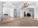 Elegant entryway with high ceilings and views to the living and dining areas at 9845 E Inglewood St, Mesa, AZ 85207