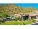 Single-story home with a three-car garage and mountain views at 9845 E Inglewood St, Mesa, AZ 85207