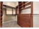 Large walk-in closet with ample shelving and drawers at 9845 E Inglewood St, Mesa, AZ 85207