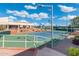 Well-maintained tennis court with ample lighting at 9614 E Bud Ct, Sun Lakes, AZ 85248