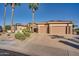 Three-car garage home with a welcoming curb appeal at 19301 N Ponderosa Ct, Surprise, AZ 85387