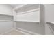 Walk-in closet with ample shelving and hanging space at 1523 W Saddle Run, Apache Junction, AZ 85120