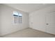 Simple bedroom with a window and carpet flooring at 9951 S Centennial Rd, Apache Junction, AZ 85120