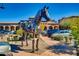 Modern metal horse sculpture in front of shops and parking lot at 10804 N Mangrum Ct, Fountain Hills, AZ 85268