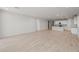Open living room with tile floors and an open concept kitchen at 1521 W Saddle Run, Apache Junction, AZ 85120