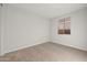 Well-lit bedroom with carpeted floors and a window at 1521 W Saddle Run, Apache Junction, AZ 85120