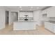 Modern kitchen with island and white cabinets at 1521 W Saddle Run, Apache Junction, AZ 85120