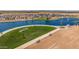 Aerial view of community lake and parking lot at 1449 W Saddle Run, Apache Junction, AZ 85120