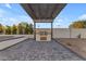 Outdoor kitchen with built-in grill under pergola at 12222 N 74Th St, Scottsdale, AZ 85260