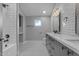 Modern bathroom with white subway tiles and double vanity at 12222 N 74Th St, Scottsdale, AZ 85260