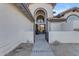 Elegant entry with a walkway and wrought iron gate at 12222 N 74Th St, Scottsdale, AZ 85260