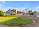 Single story home with spacious lawn and pool at 12222 N 74Th St, Scottsdale, AZ 85260
