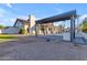 Modern pergola covers a large patio area at 12222 N 74Th St, Scottsdale, AZ 85260