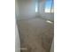 Spacious carpeted bedroom with large windows and ample natural light at 25241 W Wayland Dr, Buckeye, AZ 85326