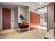 Bright and spacious entryway with built-in shelving and wood accents at 42515 N 102Nd St, Scottsdale, AZ 85262
