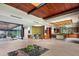 Open kitchen with wood cabinetry and a large island at 42515 N 102Nd St, Scottsdale, AZ 85262