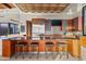 Gourmet kitchen with custom cabinetry and a spacious island at 42515 N 102Nd St, Scottsdale, AZ 85262