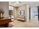 Long hallway with built in bench and art pieces at 42515 N 102Nd St, Scottsdale, AZ 85262