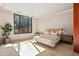 Comfortable bedroom with large window and mountain views at 42515 N 102Nd St, Scottsdale, AZ 85262
