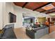 Open living space with a modern fireplace and views to a courtyard at 42515 N 102Nd St, Scottsdale, AZ 85262