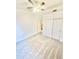 Bright bedroom with ceiling fan and ample closet space at 1639 E Redfield Rd, Gilbert, AZ 85234