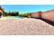 Large backyard with gravel and a sparkling pool at 1639 E Redfield Rd, Gilbert, AZ 85234