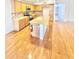 Kitchen features wood cabinets, granite countertops, and island at 1639 E Redfield Rd, Gilbert, AZ 85234
