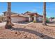 Beautiful curb appeal with a well-maintained front yard and landscaping at 1639 E Redfield Rd, Gilbert, AZ 85234