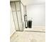 Garage with water softener and storage cabinet at 1639 E Redfield Rd, Gilbert, AZ 85234